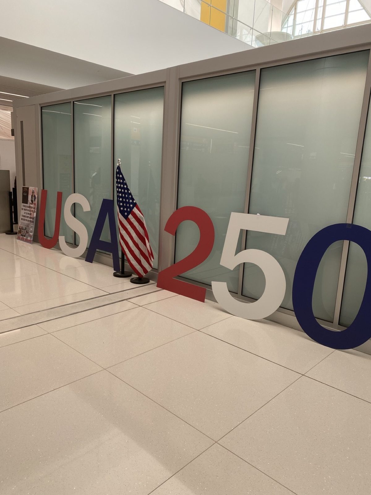 USA 250 display with American flag at DIA